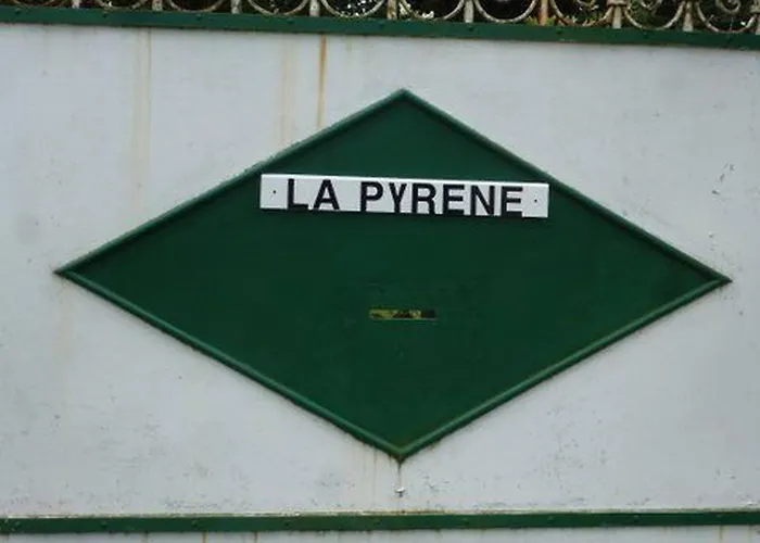 Your Pink House With Blue Shutters *